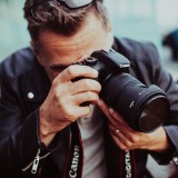 Fotograf mit Kamera