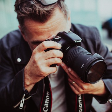 Fotograf mit Kamera