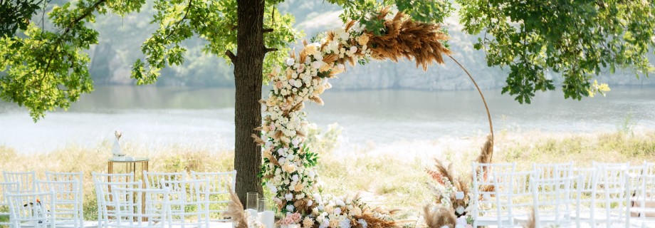 wedding ceremony area with dried flowers in a meadow in a forest